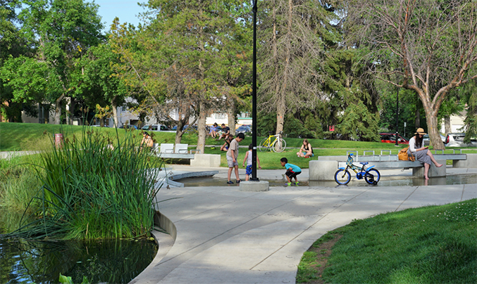 Children playing at a splash park