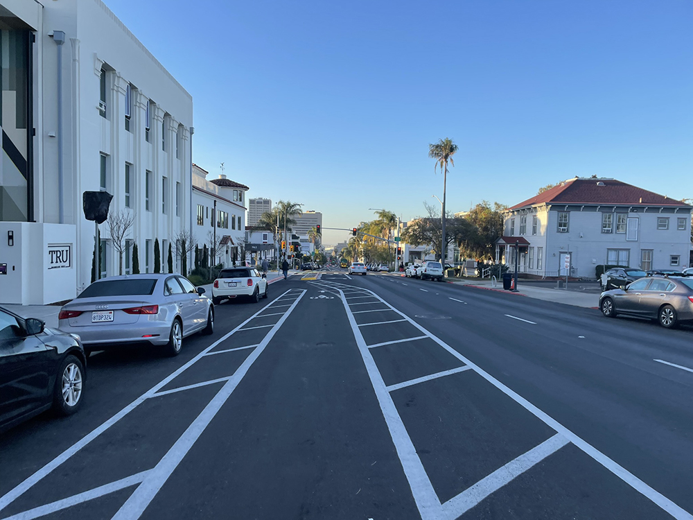 Example of bike lane next to vehicle lane with curbside parking