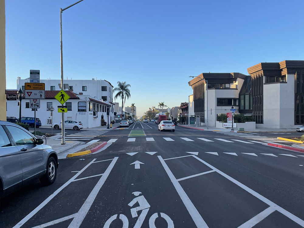 Example of bike lane next to vehicle lane with curbside parking