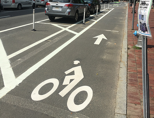 Example of floating parking spaces with curbside bike lane 