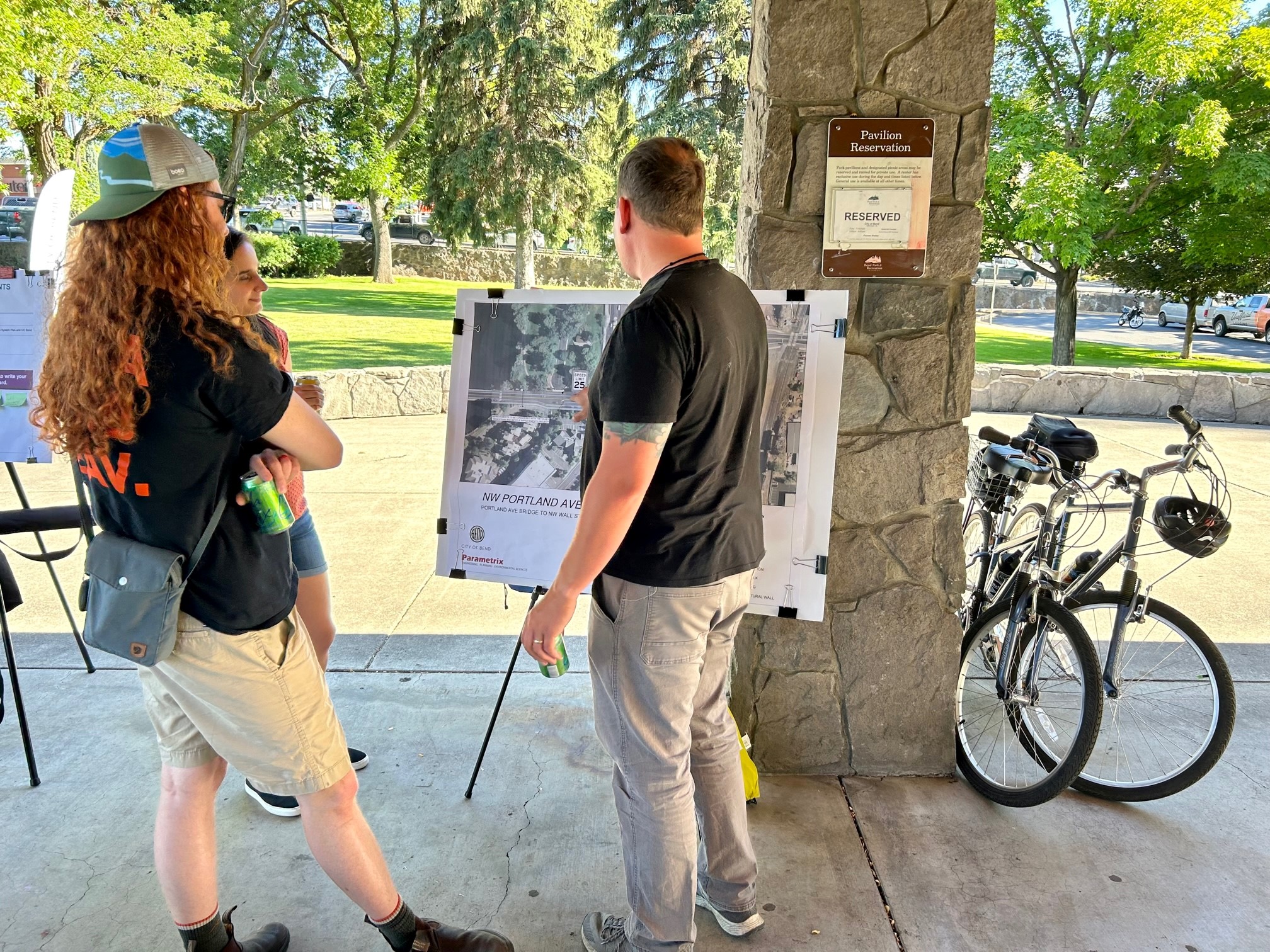 people engaging with display boards at the Olney open house